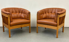 Leather Barrel Chairs